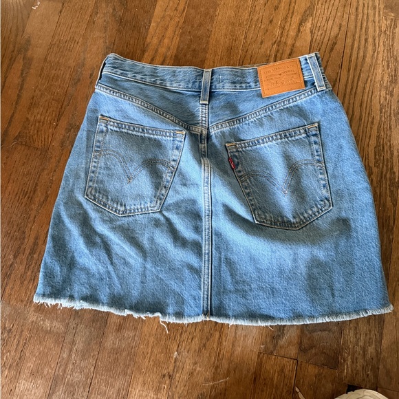 Levi's blue denim “ Rib Cage” mini skirt with frayed hem and button Size: 26” - Picture 2 of 5